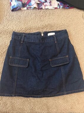 Meshki Dark Blue Denim Mini Skirt with Front Flap Pockets